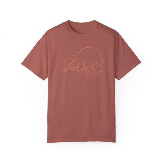 Burnt Red Tee Shirt with five surfers on one wave