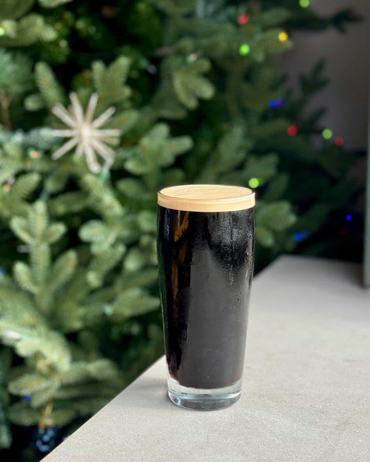 Holiday stout brewed with High Tide Coffee Guatemala being poured at Stationcraft Brewery in Dana Point, showcasing its rich, creamy winter profile.