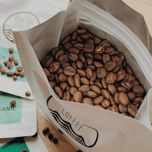 looking inside a coffee bag full of fresh roasted beans