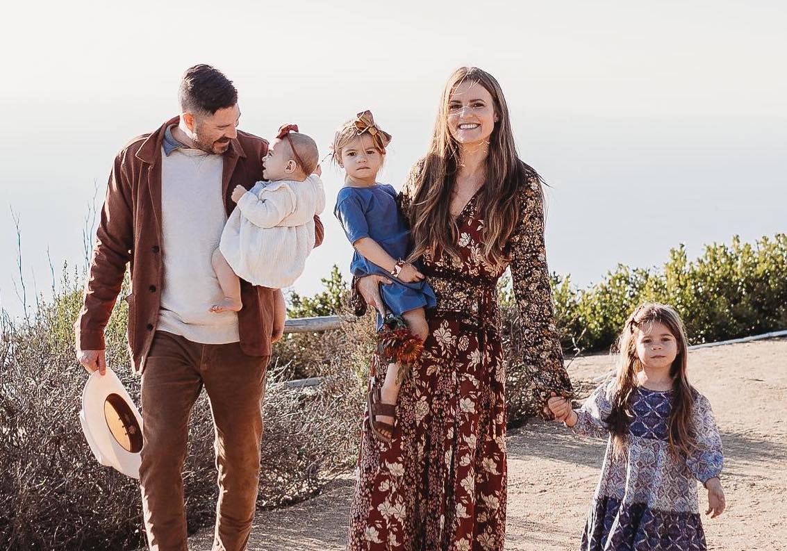 family of five walking together