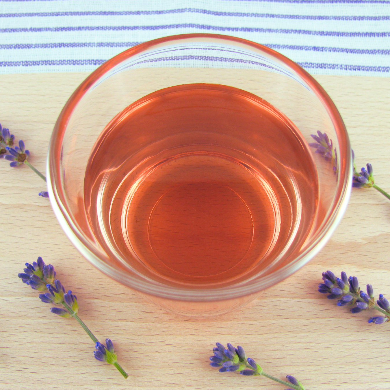 glass jar of house made lavender syrup